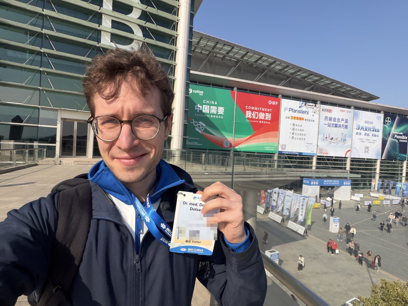 Dr. Dom outside the BIOCHINA venue in Suzhou with a conference badge
