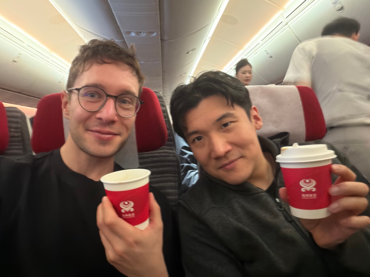 Dom and Richard toasting with Hainan Airlines coffee