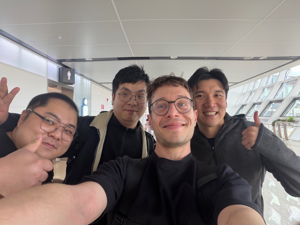 The AgentBull team — AI quant operators, Shenzhen airport, right after landing